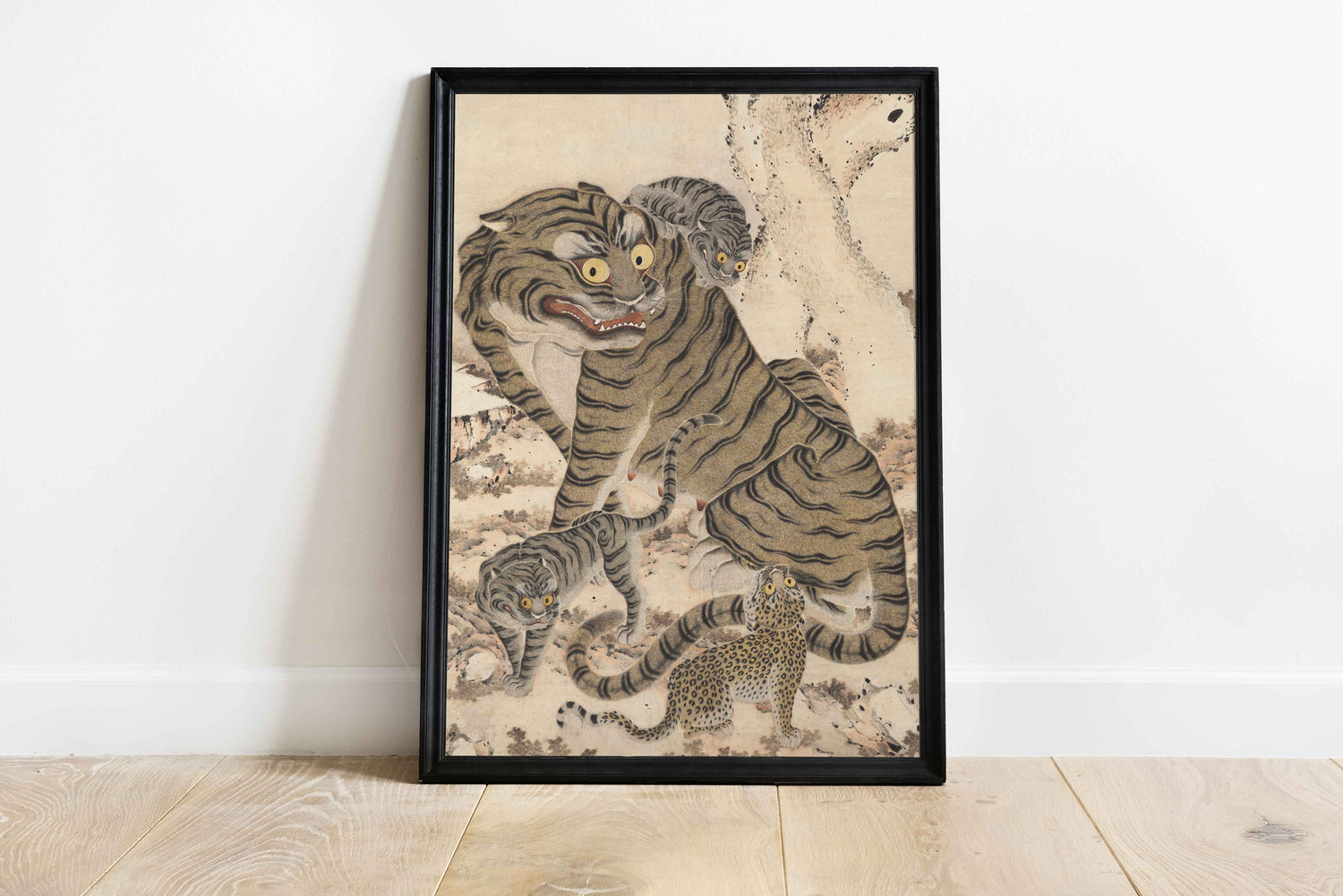 Traditional Korean Minhwa painting print from the Joseon Dynasty showing a tiger family. The artwork depicts a large tiger with expressive round eyes surrounded by tiger cubs with striped and spotted coats, set in a natural background. Korean folk art poster wall decor.