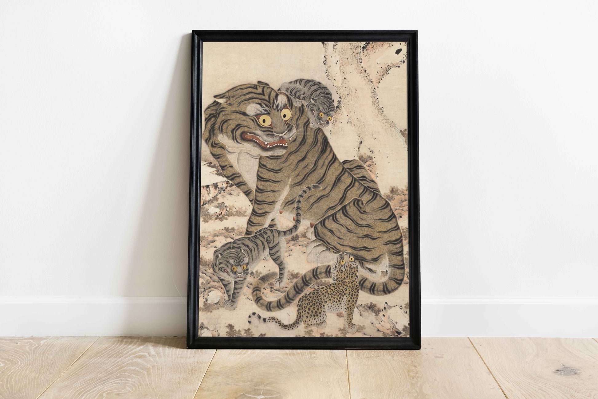 Traditional Korean Minhwa painting print from the Joseon Dynasty showing a tiger family. The artwork depicts a large tiger with expressive round eyes surrounded by tiger cubs with striped and spotted coats, set in a natural background. Korean folk art poster wall decor.