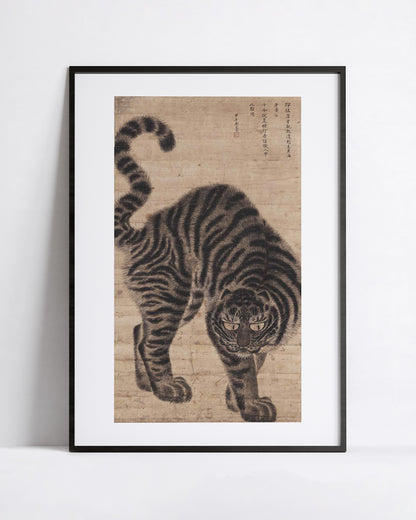 Korean ink painting of a stalking tiger with golden eyes and finely drawn fur, late Joseon dynasty, art print in a black frame