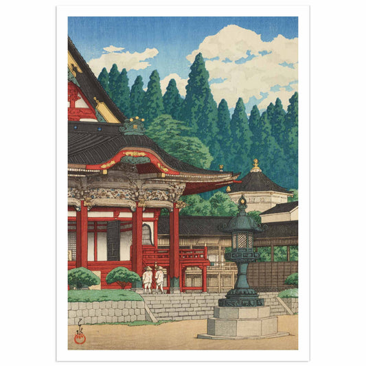 Museum-quality reproduction of Kawase Hasui's Minobusan Kuonji showing ornate red temple gate with golden decorative roof details, traditional Japanese temple buildings with dark tile roofs, large stone lantern in courtyard, two figures in white, dense green cedar forest on mountainside, white clouds in blue sky, exemplifying Shin-Hanga architectural landscape art from 1920s-1940s Japan