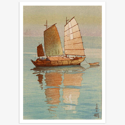 High-quality poster reproduction of the 'Sailing Boats' woodblock print by Japanese artist Hiroshi Yoshida, showing sailboats on calm water at sunrise.