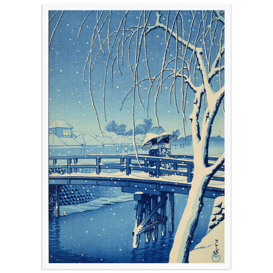 Kawase Hasui, Snow at Edo River (1932), blue version: two women with umbrellas cross a wooden bridge over the Edo River as snow falls at dusk