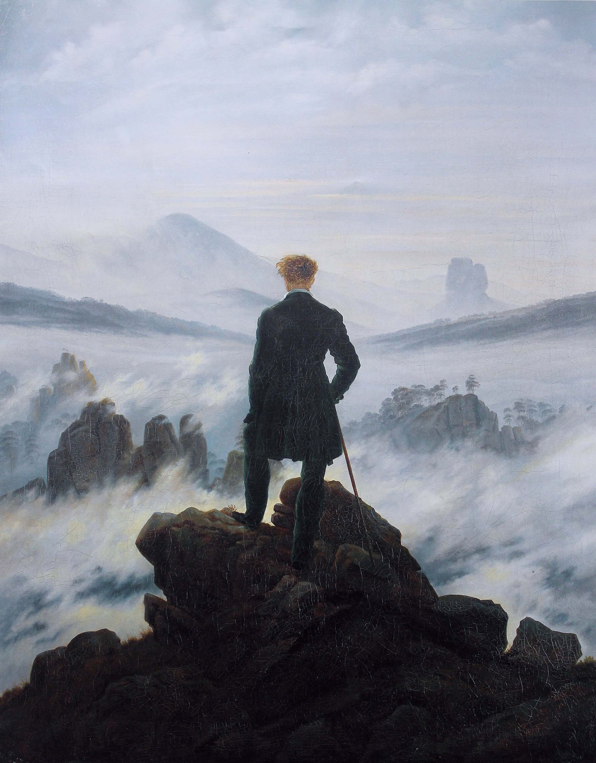 Wanderer above the Sea of Fog by Caspar David Friedrich. Oil on canvas; Man standing on a rocky outcrop with a vast landscape and clouds in the background