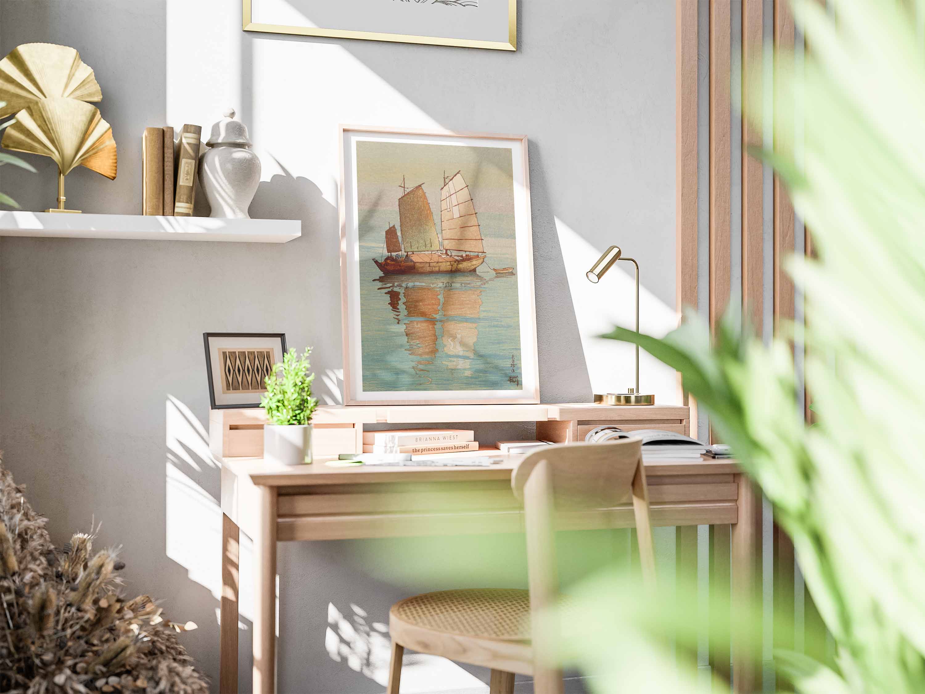 Home office with a desk, chair, and framed artwork on a wall fromWallango japanese woodblock prints collection. 