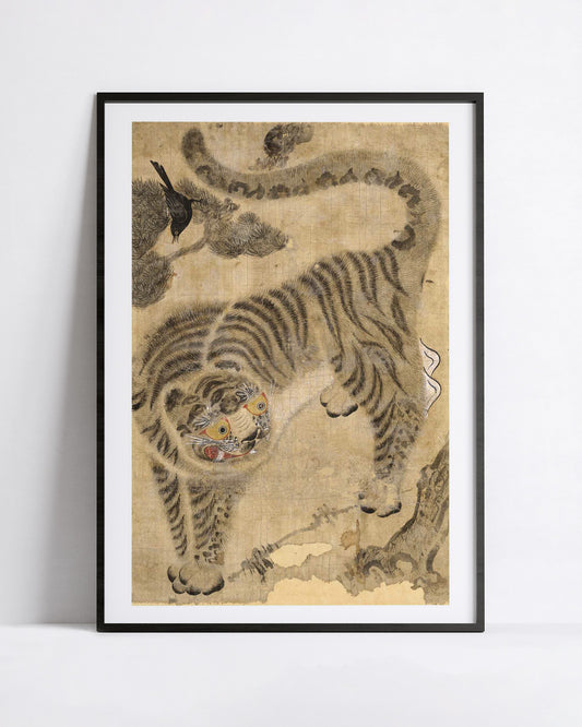 A framed art print featuring a traditional korean-style tiger illustration on an aged beige background, displayed against a clean white wall.