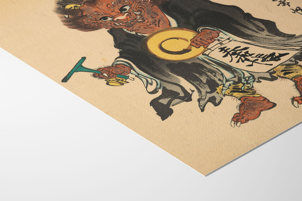 A close-up of a Japanese-style art print or poster showing a demon-like figure with red skin, black robes, and a large yellow circular emblem, photographed on a white background with the print angled diagonally.