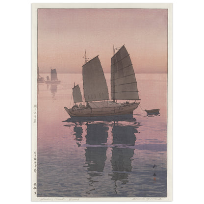 Sailing Boats: Evening by Hiroshi Yoshida (1926), shin-hanga woodblock print of a sailboat with dark sails anchored under a pink sunset sky, other boats on the horizon, long reflections on lavender water