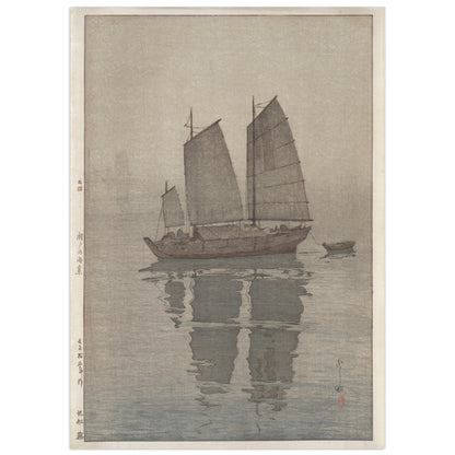 Sailing Boats: Mist by Hiroshi Yoshida (1926), shin-hanga woodblock print of a sailboat with grey sails anchored in thick fog, a second boat barely visible behind, reflections on still water